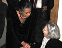 Joyce Woodson, PLTI Chair, greets Donna Bergheim, friend of PLTI and MetroStage